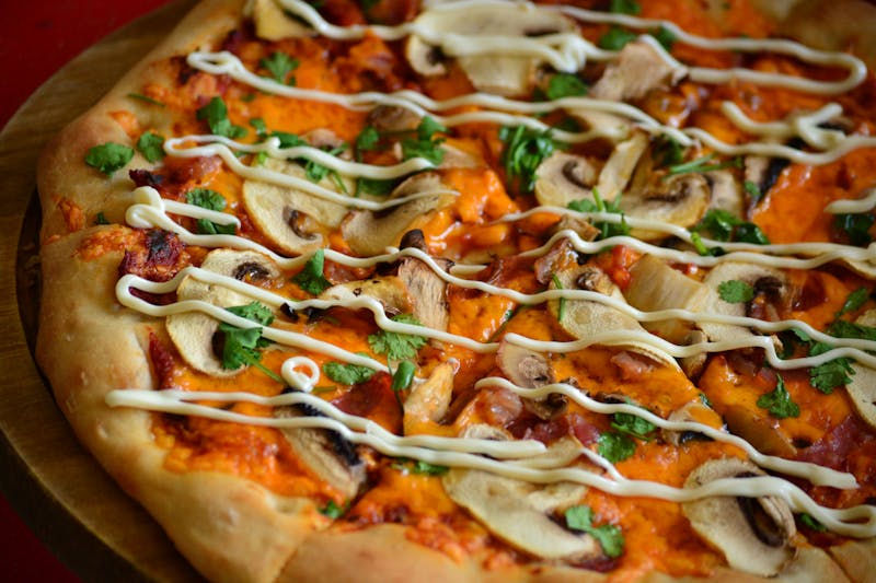 Truffle mushroom pizza with white truffle oil and wild mushrooms