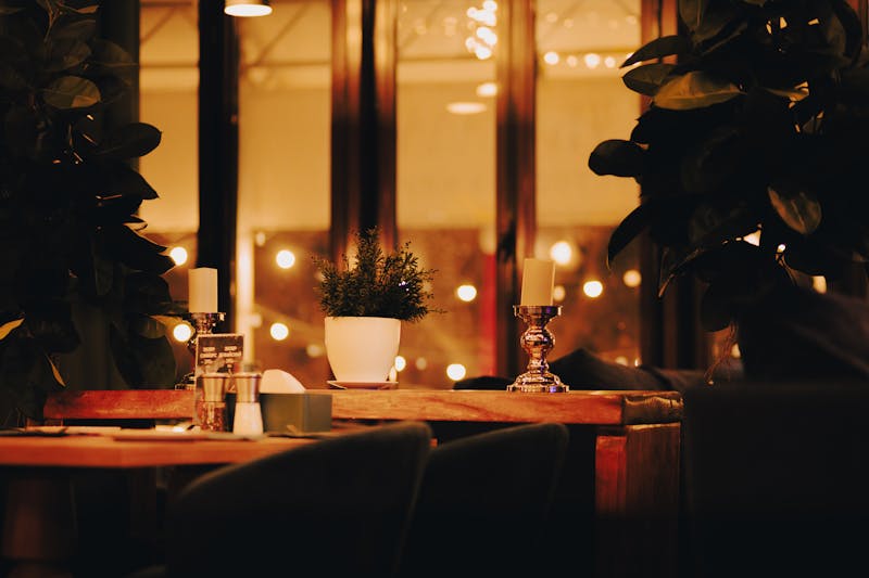 Cozy booth seating and warm lighting inside Jet's pizza restaurant